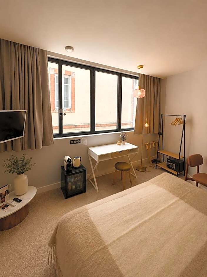 Hôtel Une Chambre en Ville