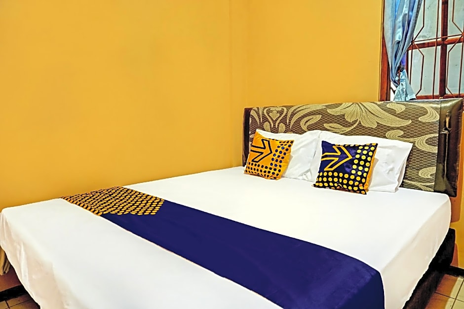 SPOT ON 92450 Homestay Simpang Panji Suroso Syaria