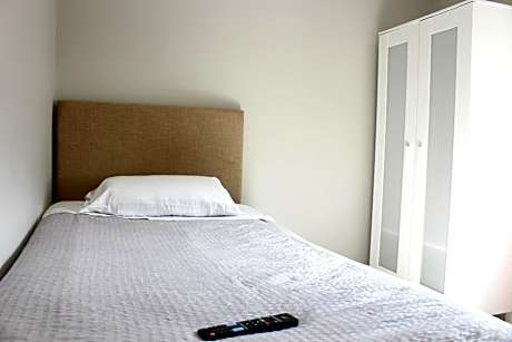 Basic Single Room with Shared Bathroom