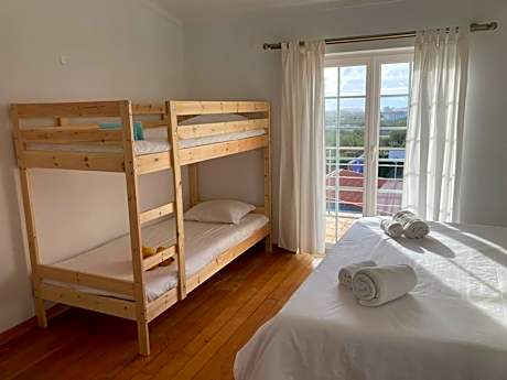 Quadruple Room with Shared Bathroom