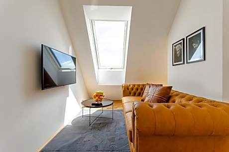 One-Bedroom Apartment with Balcony and City View