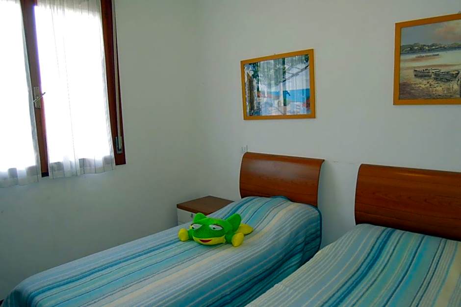 Three-Room Apartment with Garden and Shared swimming pools - By Beahost Rentals