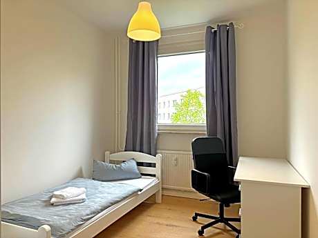 Three-Bedroom Apartment with Balcony