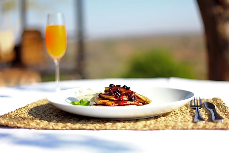 Ivory Wilderness River Rock Lodge