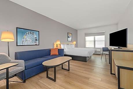 King Suite with Sofa Bed and No View - Mobility/Hearing Accessible with Transfer Shower