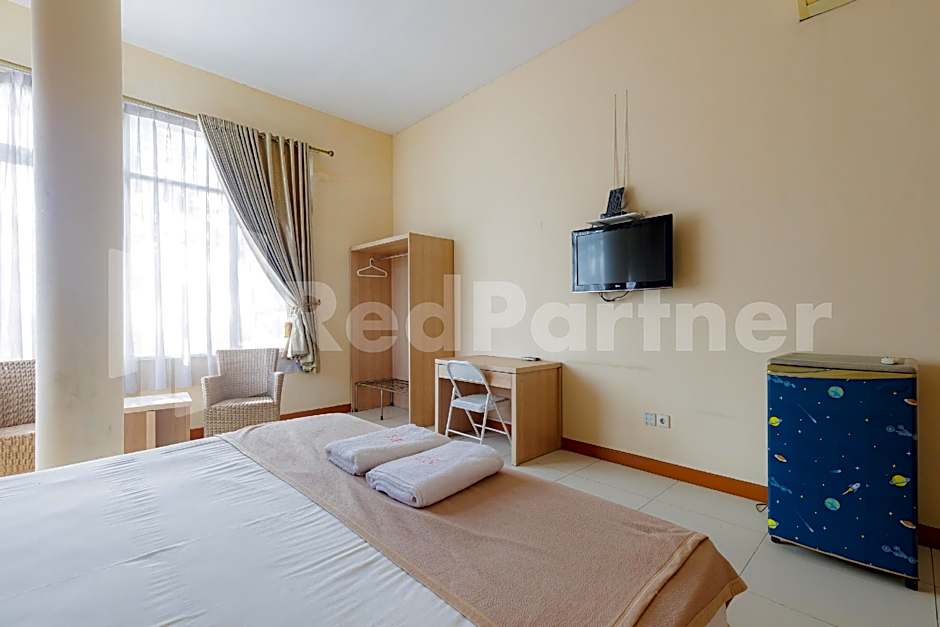 Wisma Anggrek Syariah Mitra Reddoorz