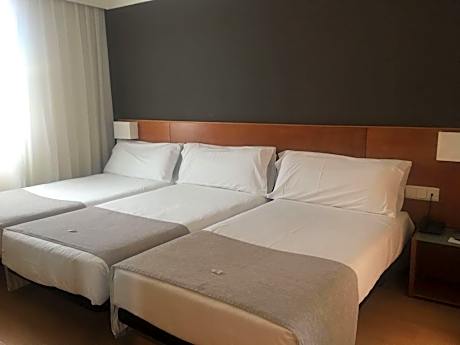 Triple Room (2 Adults + 1 Child)