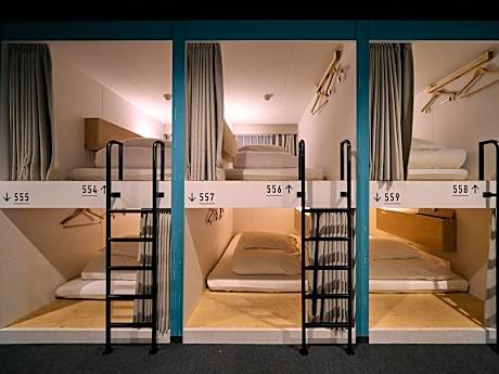 Lower Bunk Bed in Male Dormitory Room