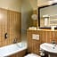 Escala Hotel & Suites