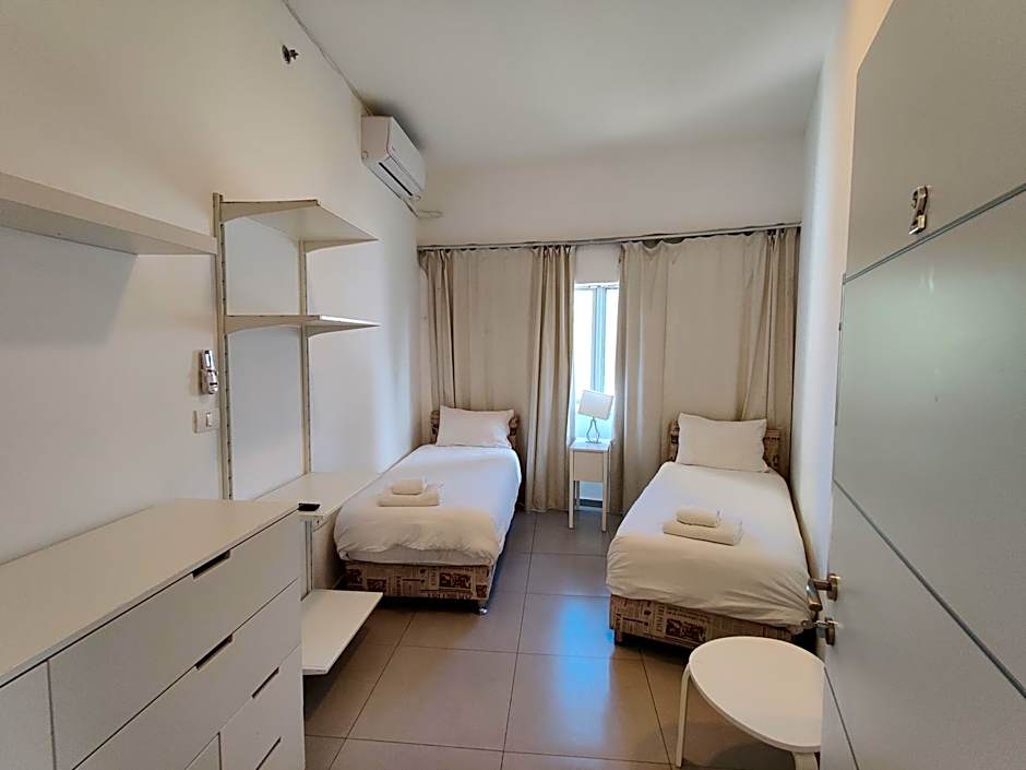 Begin19 Apartments & Hostel