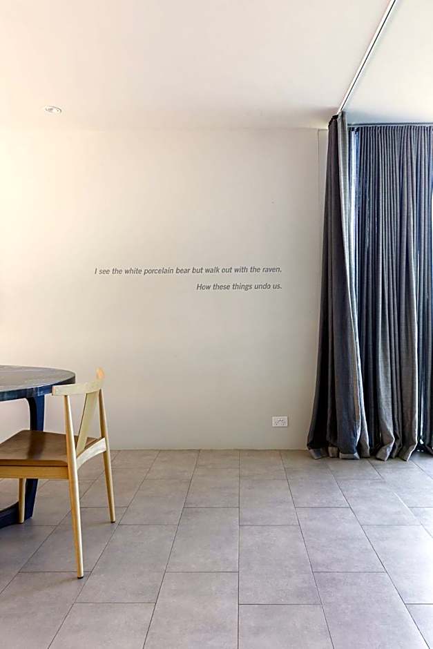 Architectural glass house with ocean views