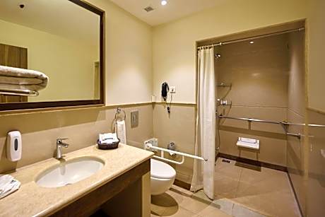 Deluxe king room with complimentary airport transfers