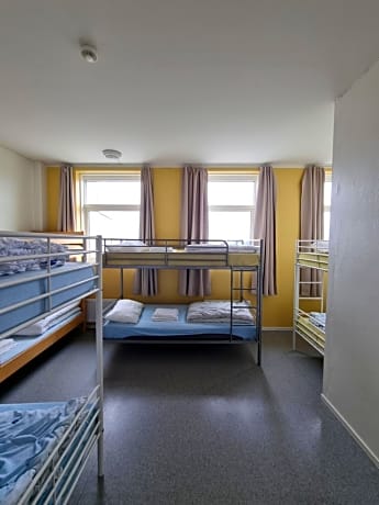 Single Bed in Female Dormitory Room