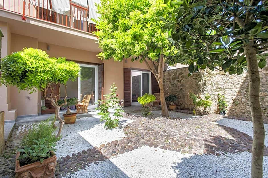 ClickSardinia Alghero Spectacular waterfront Neptune apartment with sea-facing terraces and garden