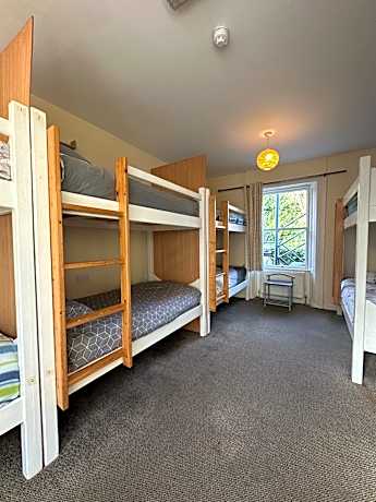Single Bed in Dormitory Room