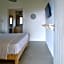 Rooster Guesthouse Rooms
