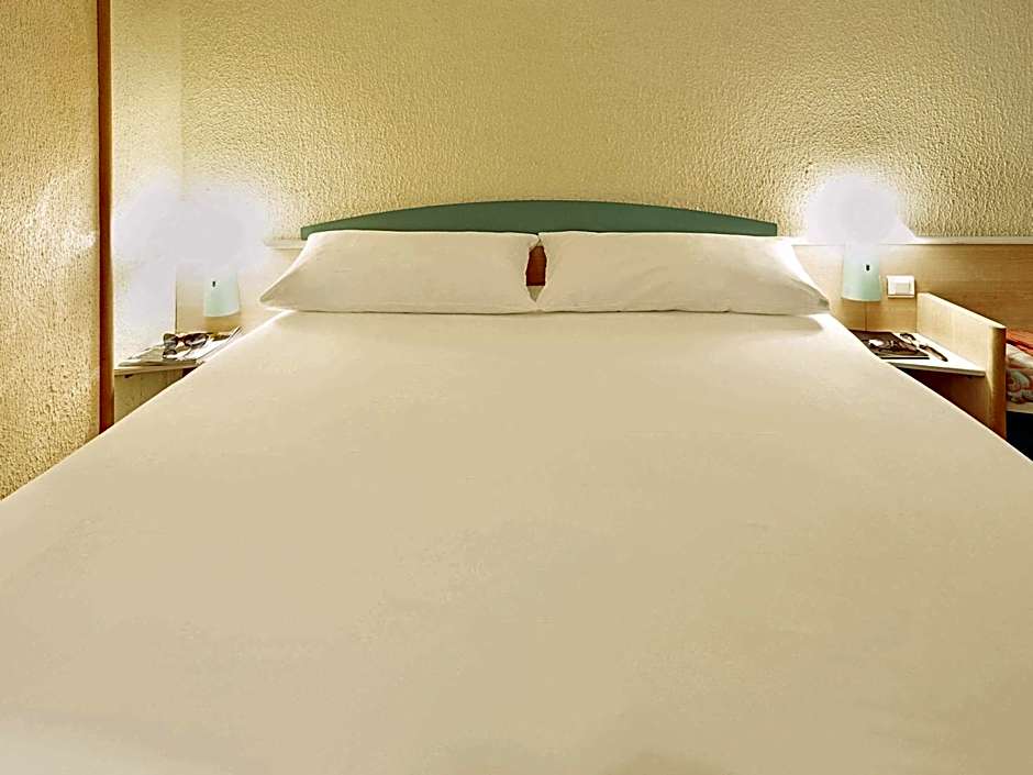 Photo 1 sur 12 de Standard 1 Queen Bed