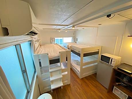 Economy Quadruple Room with Shared Bathroom