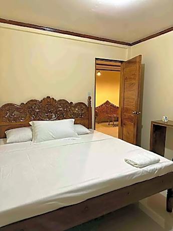 Cozy two bedroom unit in Caramoan Cam Sur Room 3