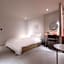 Croissant Hotel Guri by Anook