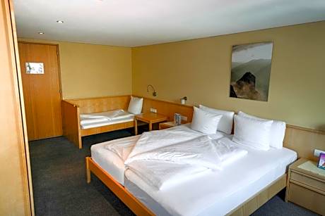 Basic Quadruple Room (2 Adults + 2 Children)