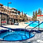Rocky Mountain Getaway with Outdoor Heated Pool, 3 Hot Tubs, Gym, BBQ, Garage & 24 hour Reception near Banff