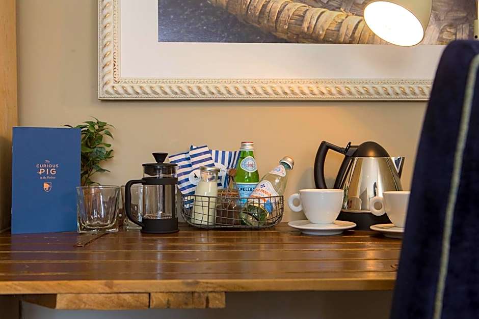 The Curious Pig in the Parlour