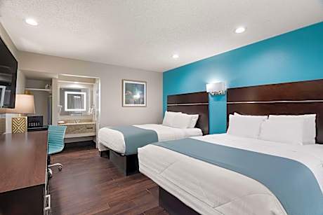 2 Queen Beds, Non-Smoking, Mini Fridge, Wi-Fi, Flat Screen Television, Work Desk, Continental Breakf