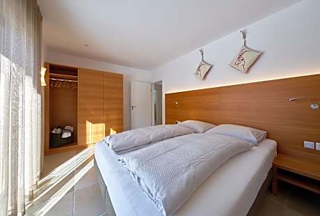 Three-Bedroom Apartment with Balcony and Terrace