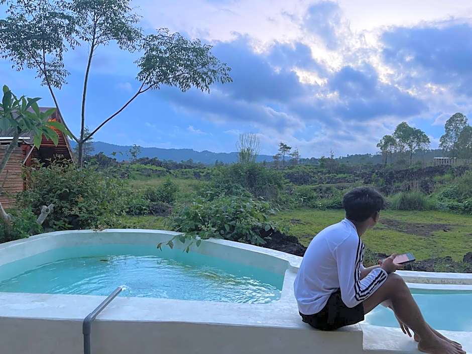 Triangular house and hot spring