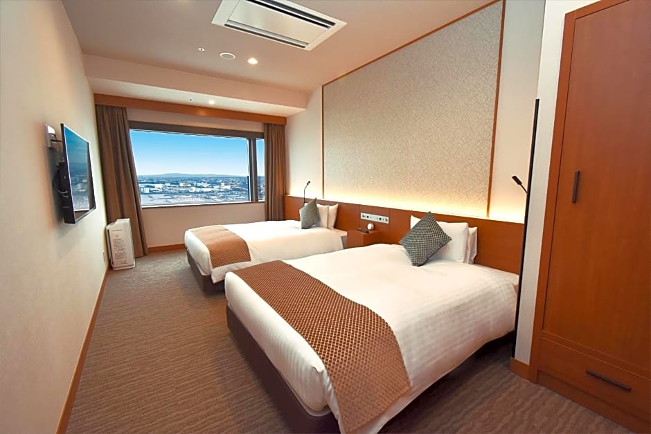 Odysis Suites Osaka Airport Hotel