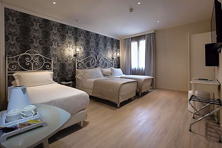 Photo 1 of 4 of Triple Room