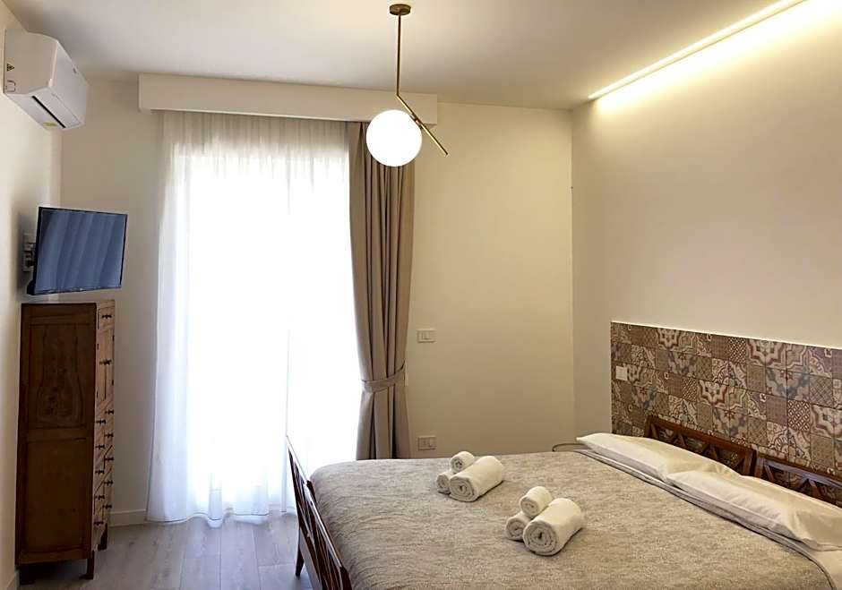 Accòmodati - Camere e Appartamenti