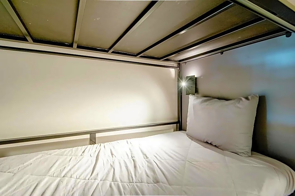 Cozy Bed in mixed room