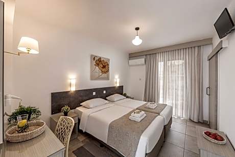 Triple Room (2 Adults + 1 Child)