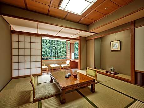 Japanese-Style Room With River and Forest View