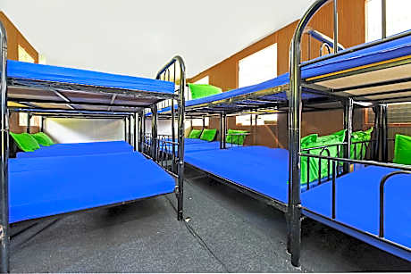A Bed in All-Male Dormitory Bedroom