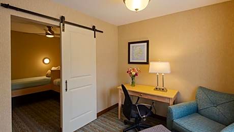 Two bedroom Suite with 1 King bed and 2 Single beds – Non Smoking