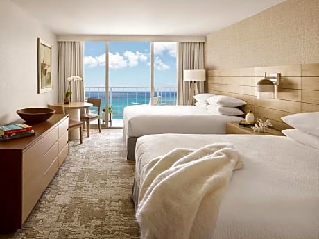 Two Queen Beds and Premier Ocean Front View