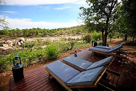 Ivory Wilderness River Rock Lodge