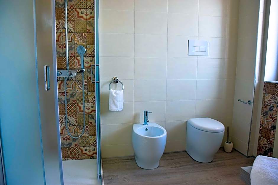 Accòmodati - Camere e Appartamenti