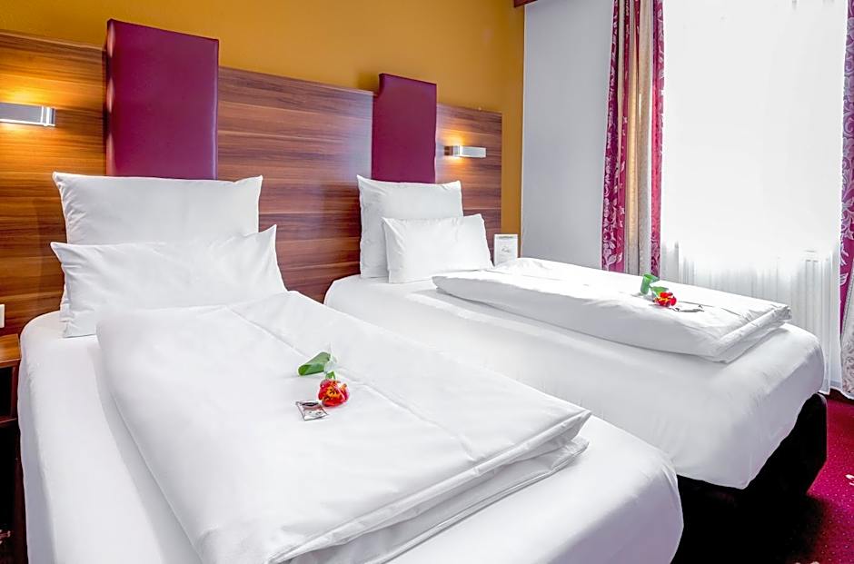 Tiptop Hotel Burgschmiet Garni