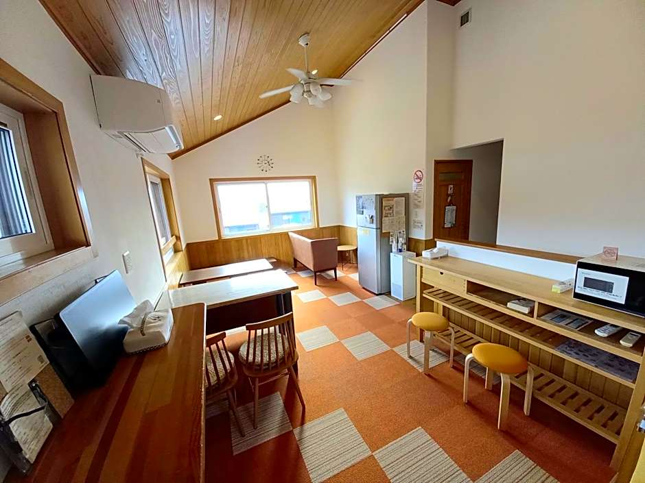Orange Cabin Inn far from station
