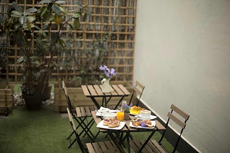 Petit Palace Tres Cruces