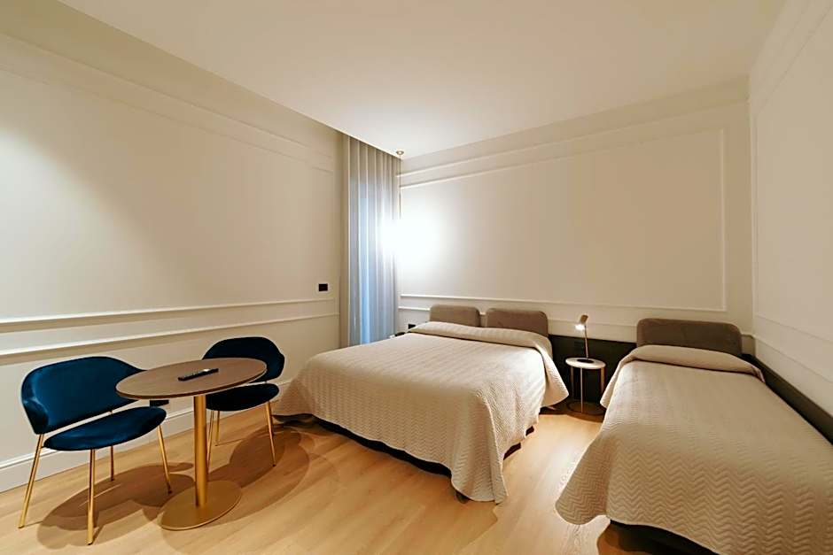 Photo 1 of 5 of Triple Room
