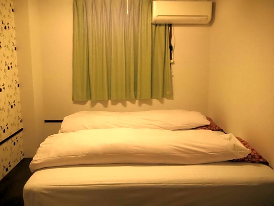 Photo 1 of 4 of Twin Room with Shared Bathroom