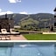 Aparthotel Familiaris - Family Apartments - Pools & Spa in Dolomites