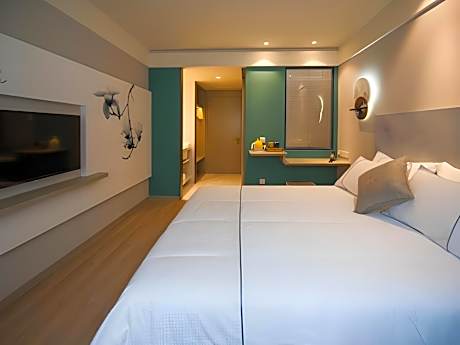 Magnotel Hotel Qionghai Wanquanhe Aihua Road