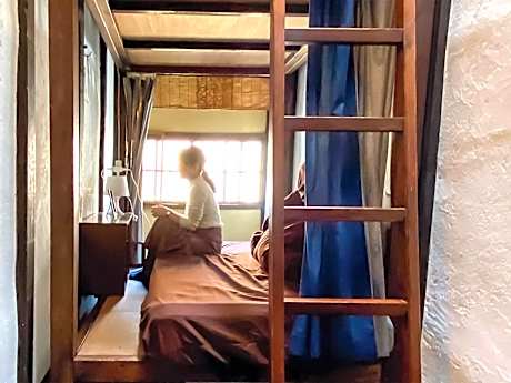 Single Bed in Female Dormitory Room