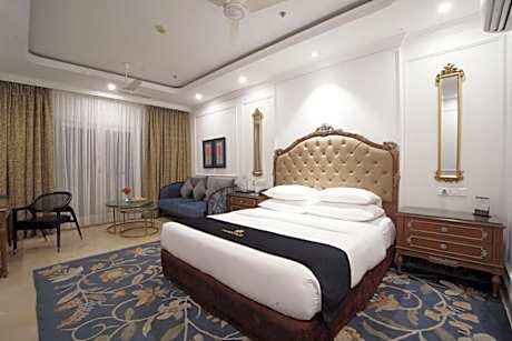 Premium Room King - 10% Discount on Foods & Soft Beverages* | 15% Discounts on Laundry Services* | INR 500 spa credit during your stay on selective Massage services. TnC Apply.* | Free Mini-bar - 2 cans of soft Beverages (Once on Arrival)